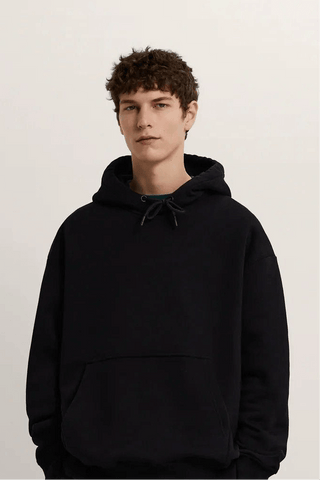 100% COTTON FLEECE HOODIES in black, showcasing high quality and unmatched comfort for casual wear.