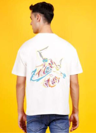 Man wearing white t-shirt with colorful graphic design on back against yellow background.